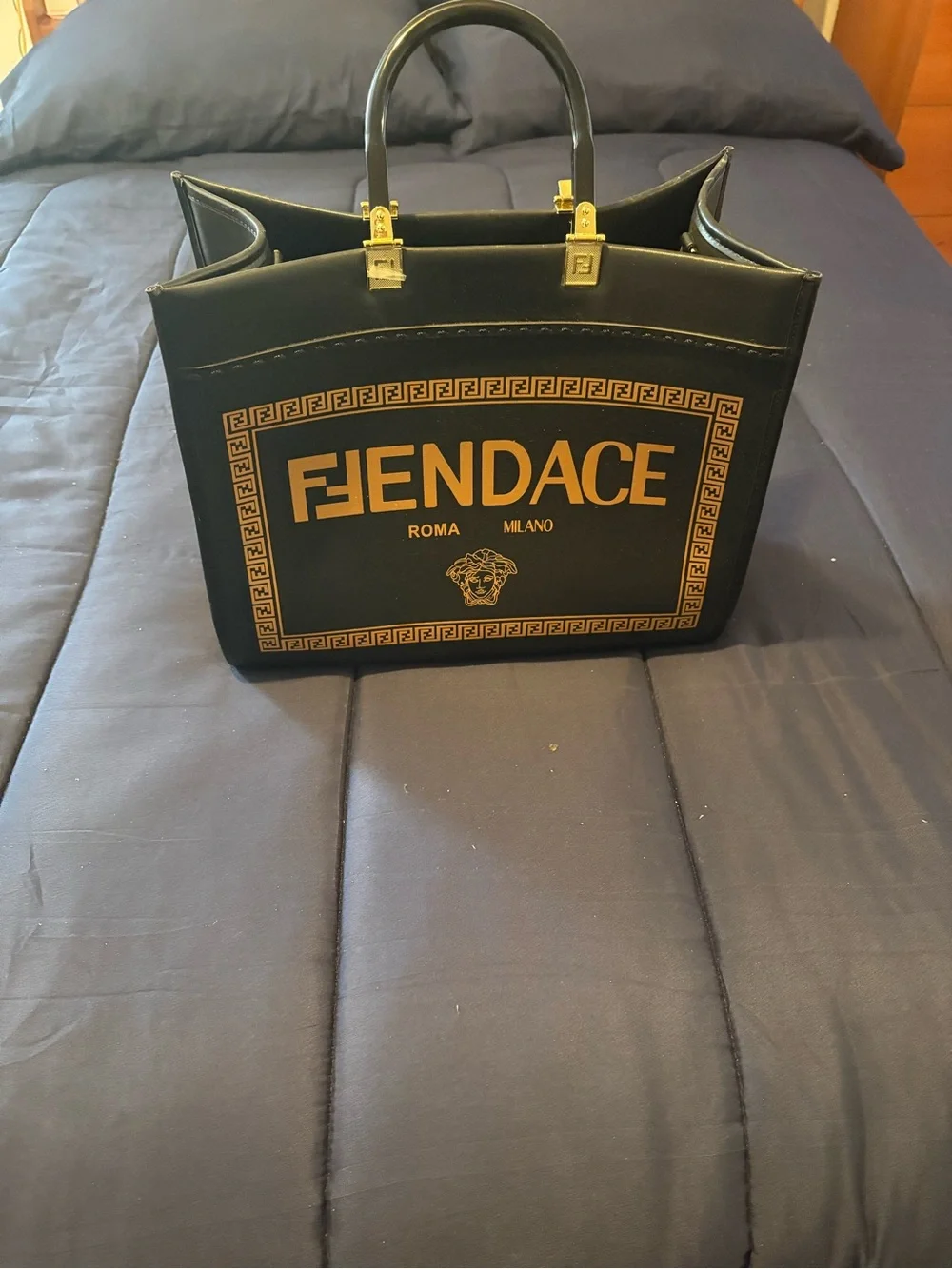 Black and Gold Leather Top-Handle Bag